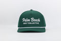 Green cap with 'Palm Beach Golf Collective' text on a white background
