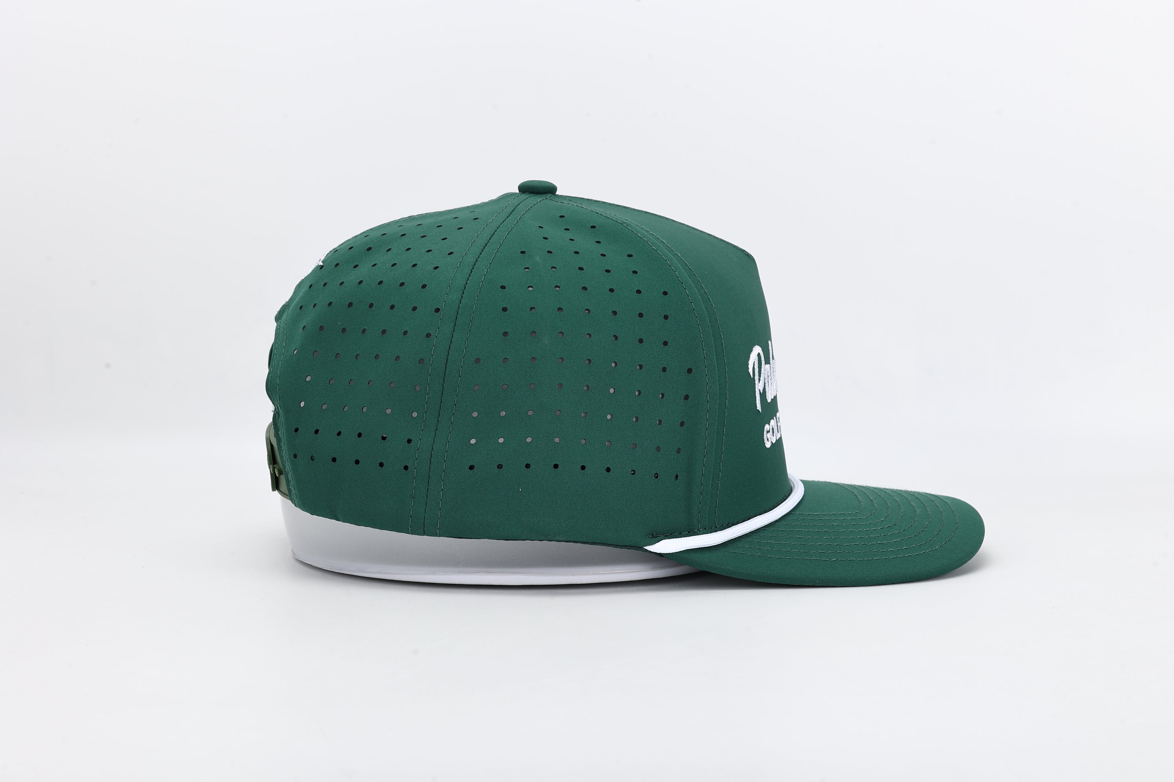 Green baseball cap with white brim on a light gray background