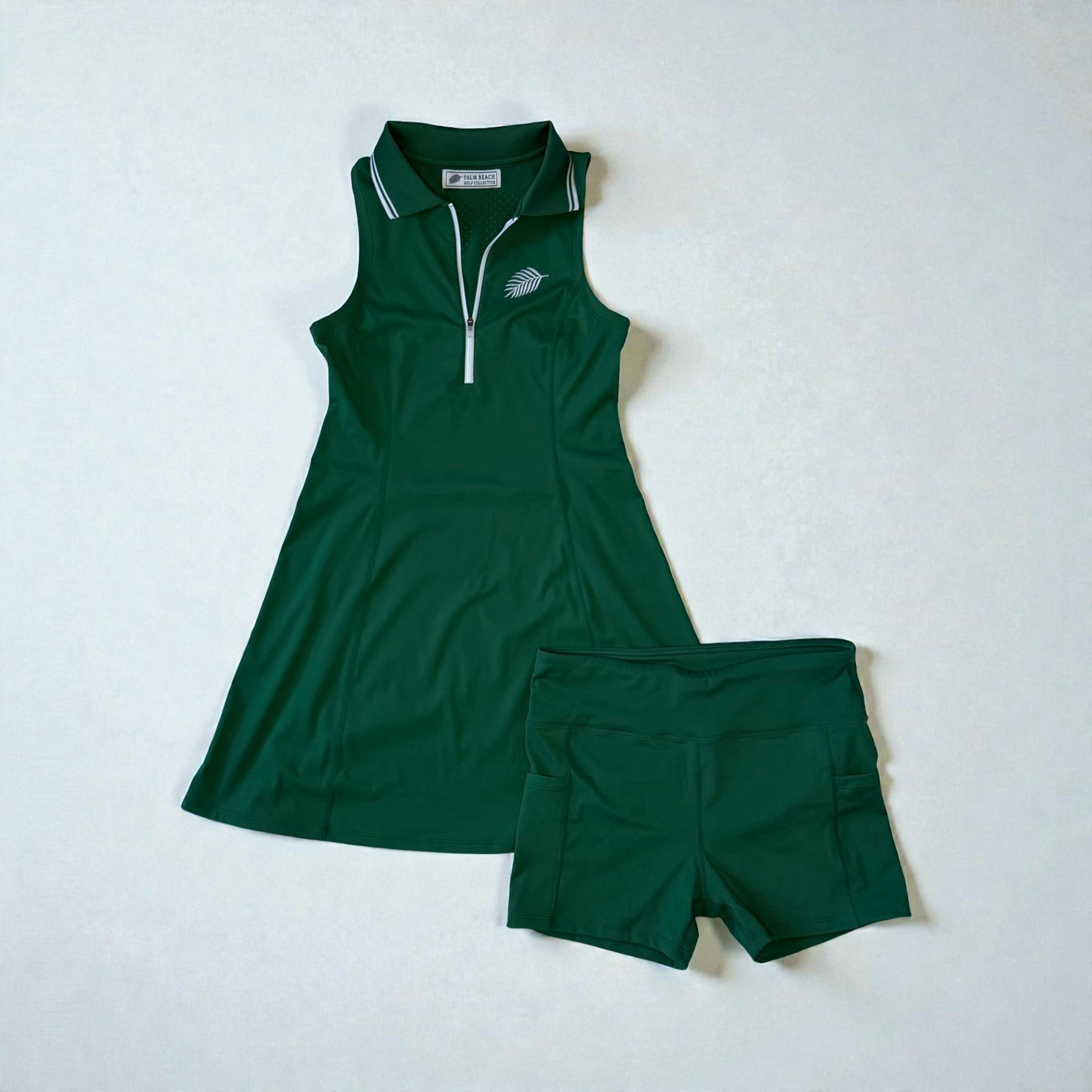 Green sleeveless top and shorts set on a white background