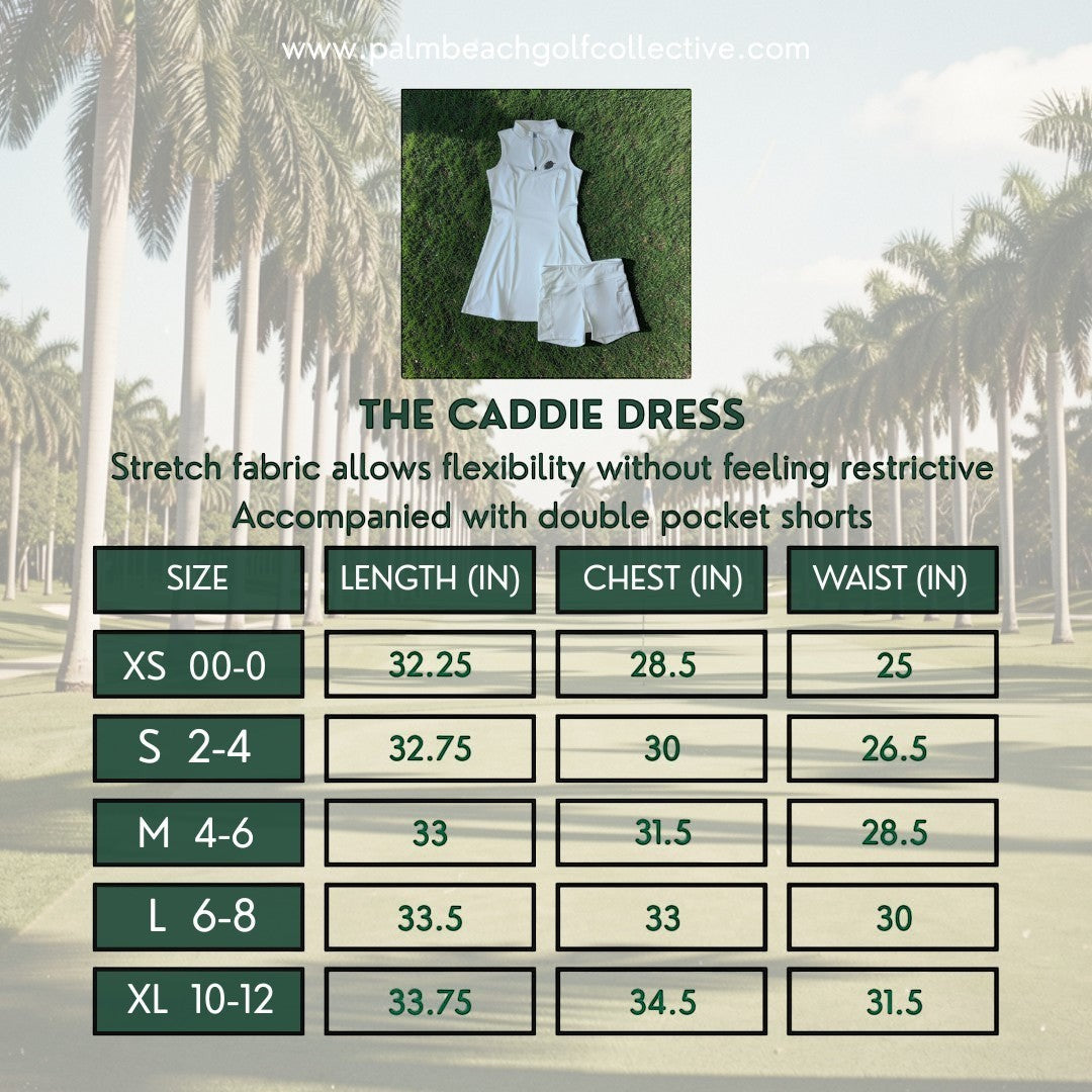 PBGC The Caddie Dress in white with matching performance shorts, featuring a sleeveless mock-neck and quarter-zip.