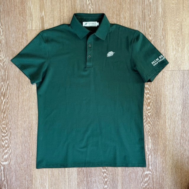 PBGC Pure Strike dark green golf polo shirt with white leaf logo on chest and sleeve branding