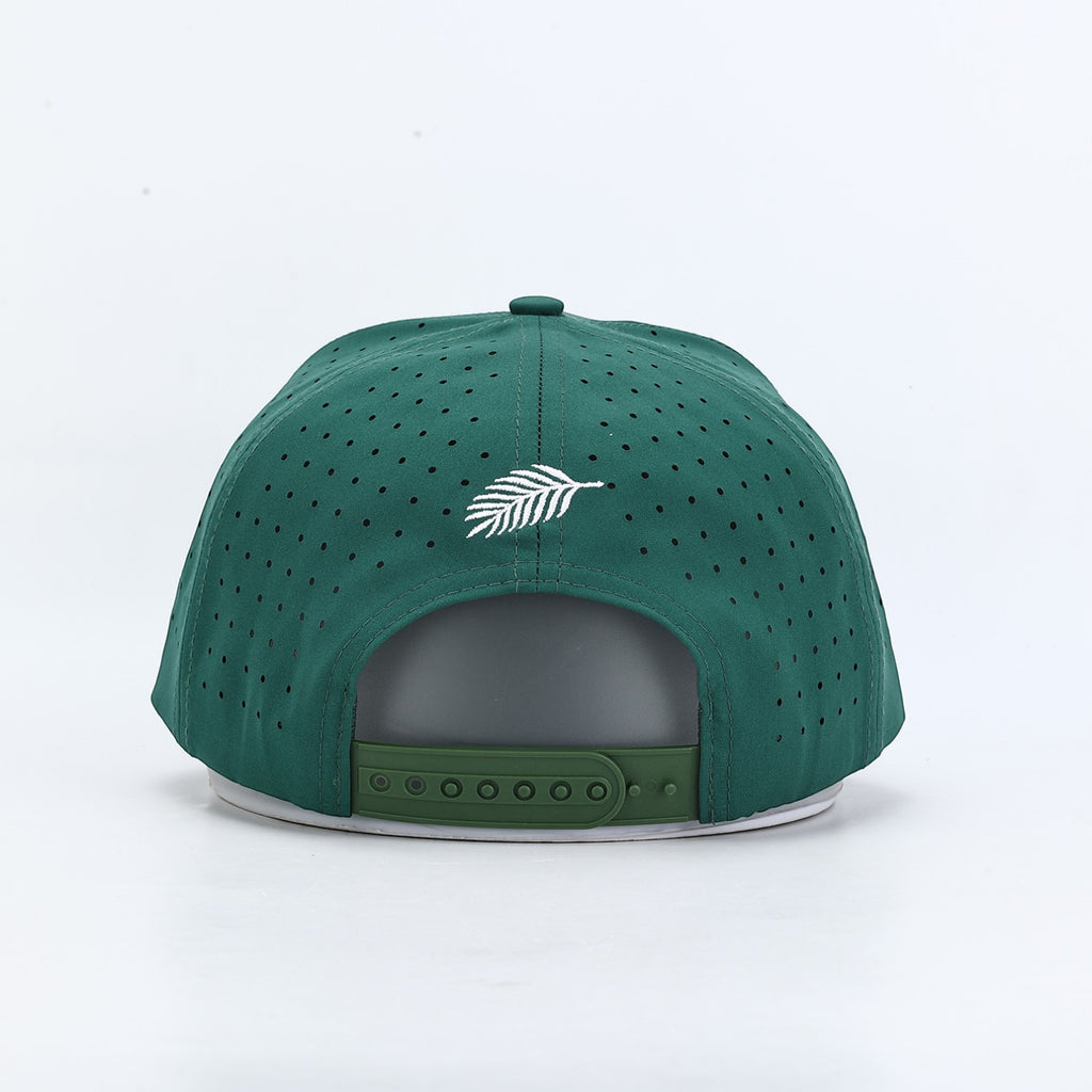 PBGC The Fairway Rope Hat in deep green with perforated fabric, snapback closure, and white palm leaf embroidery.