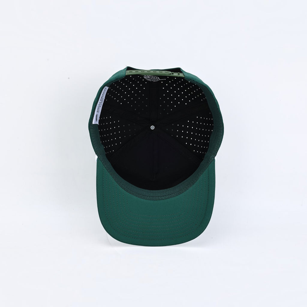 PBGC The Fairway Rope Hat in deep green with interior laser-cut perforations for breathability and snapback closure.
