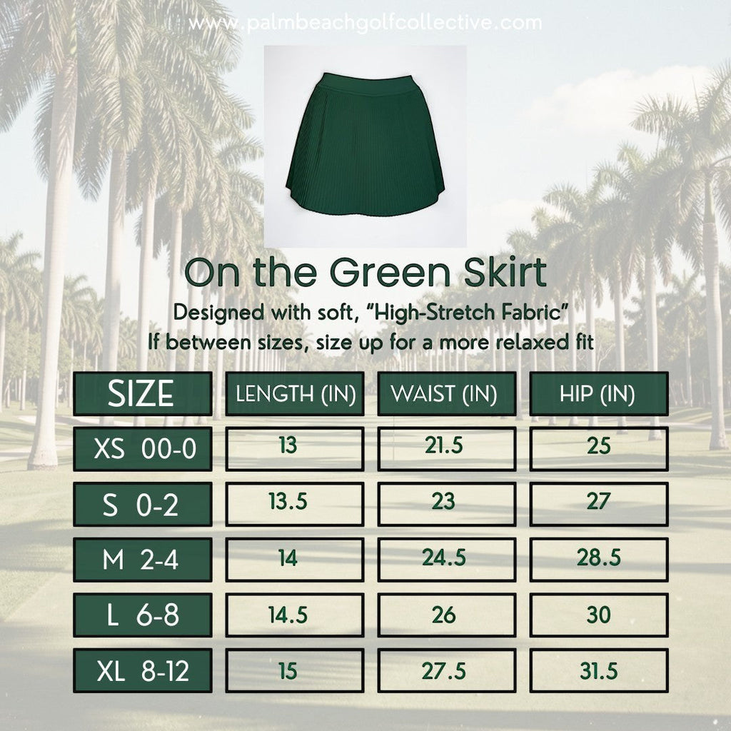PBGC On the Green Skirt in dark green with pleated design and high-waisted fit shown with a size chart.