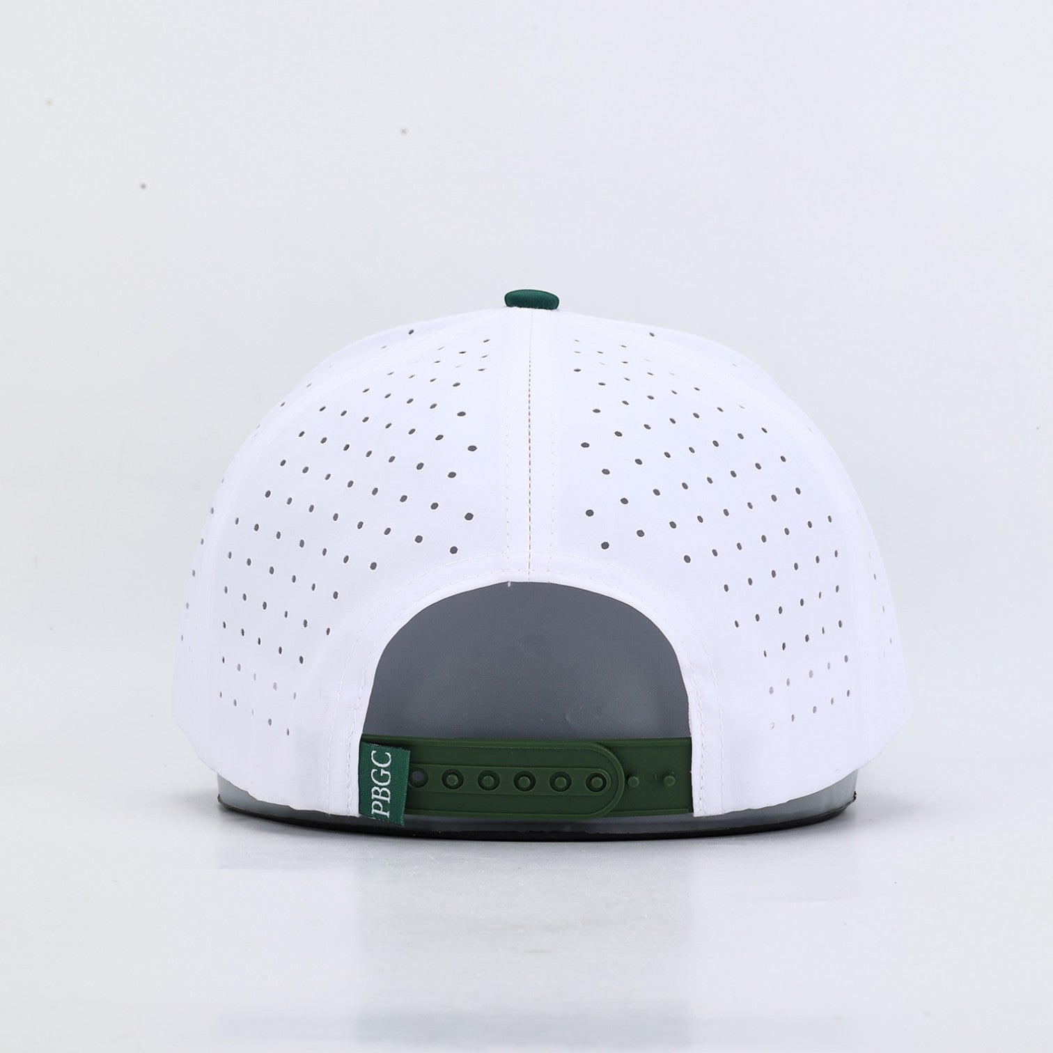 PBGC The Palm Patch Hat featuring a white perforated crown and deep green snapback closure from the rear view.