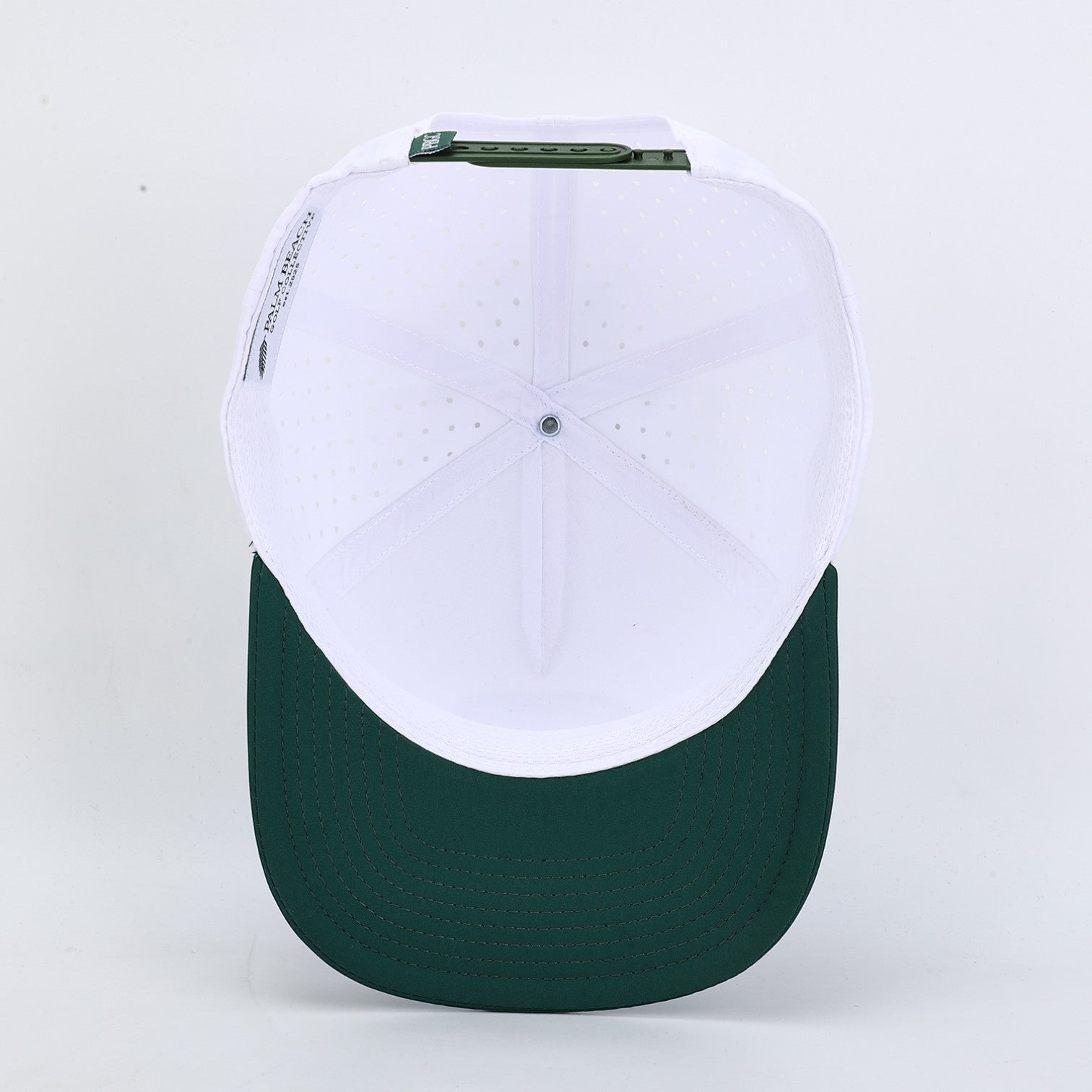 PBGC The Palm Patch Hat with white perforated crown and deep green bill, viewed from above showing snapback closure