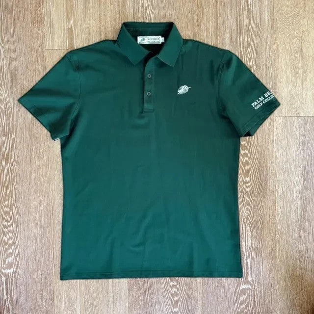 PBGC Pure Strike dark green golf polo shirt with white leaf logo on chest and sleeve branding