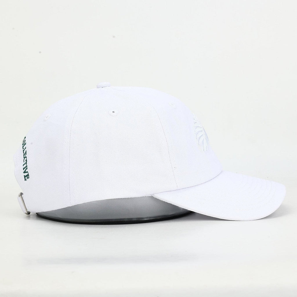 PBGC white cotton twill baseball cap with tonal fern embroidery and side text detail, side profile view.