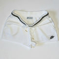 PBGC white cotton knit shorts with dark green striped waistband, drawstring closure, and palm leaf embroidery.