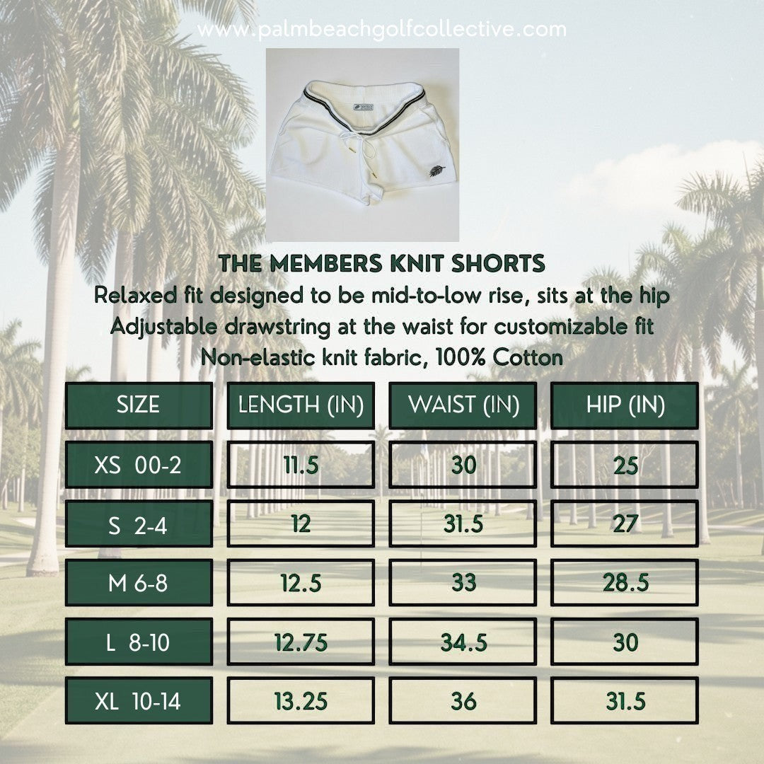 PBGC white cotton knit shorts with dark green striped waistband, drawstring, and palm leaf embroidery.