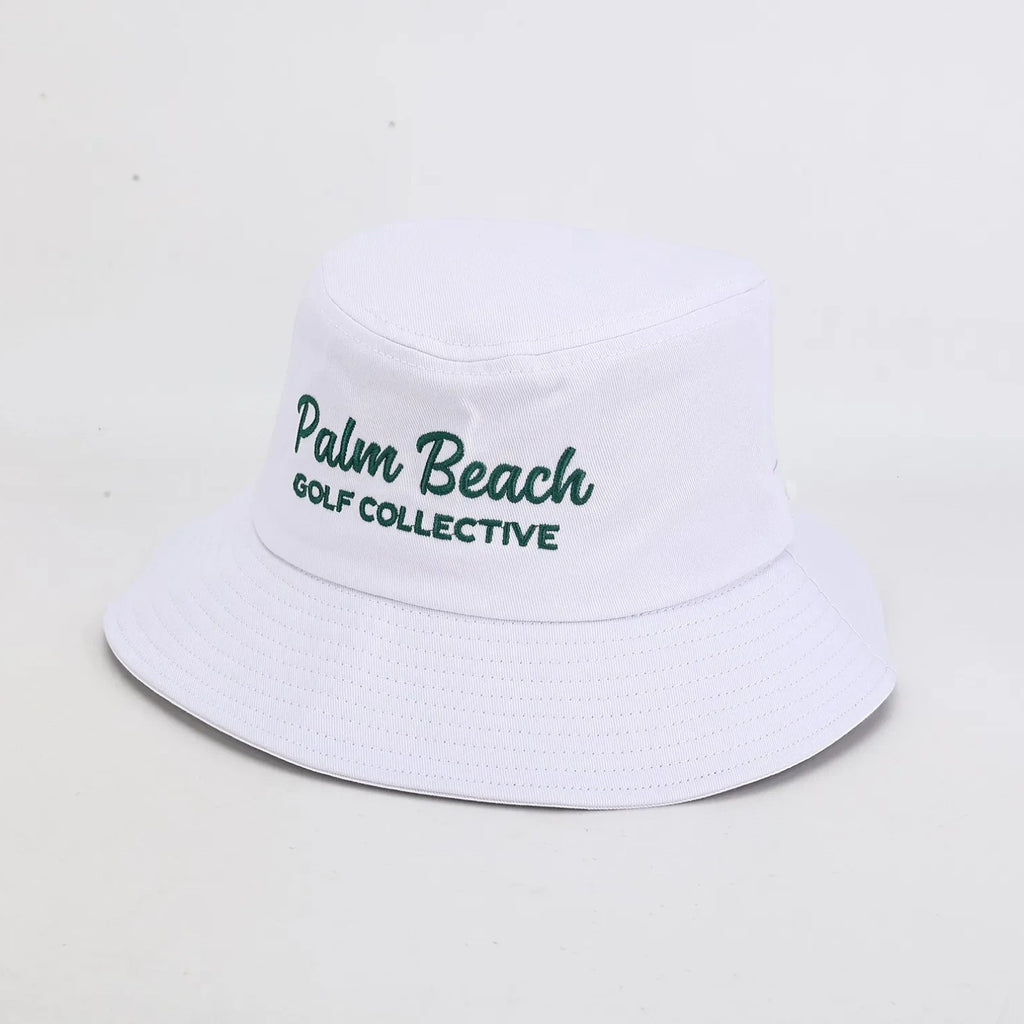 PBGC white bucket hat with green embroidered Palm Beach Golf Collective logo for sun protection on the golf course.