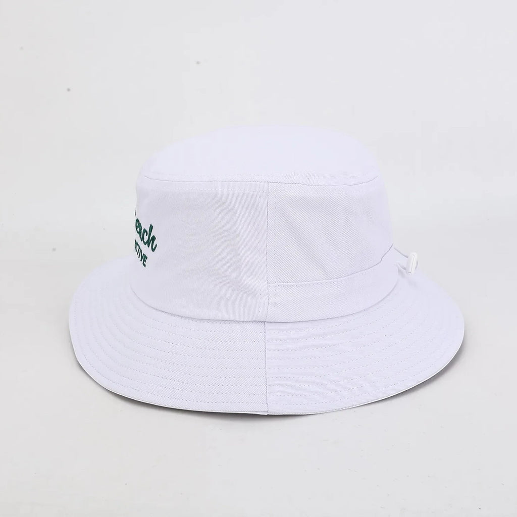 PBGC white bucket hat with green embroidered branding and adjustable chin strap for golf sun protection