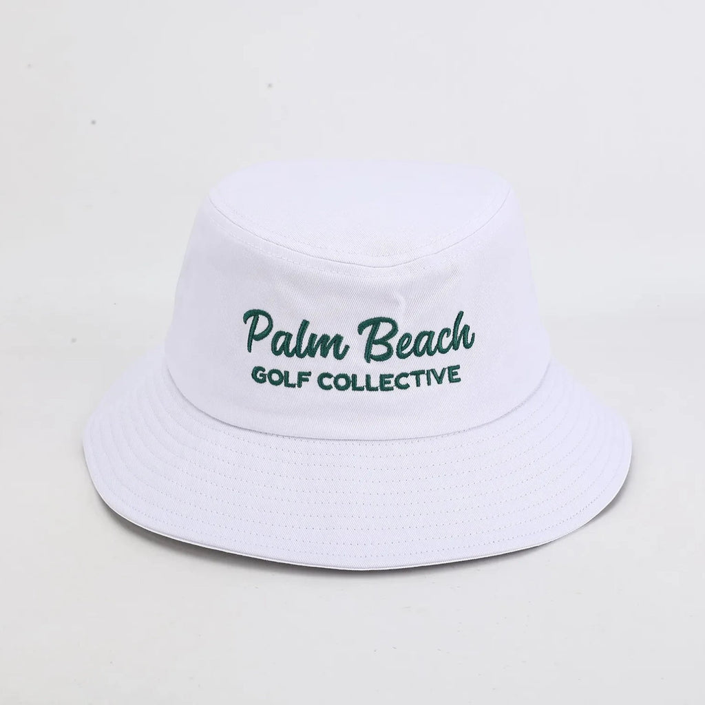 PBGC white bucket hat with green Palm Beach Golf Collective embroidery for sun protection on the golf course.