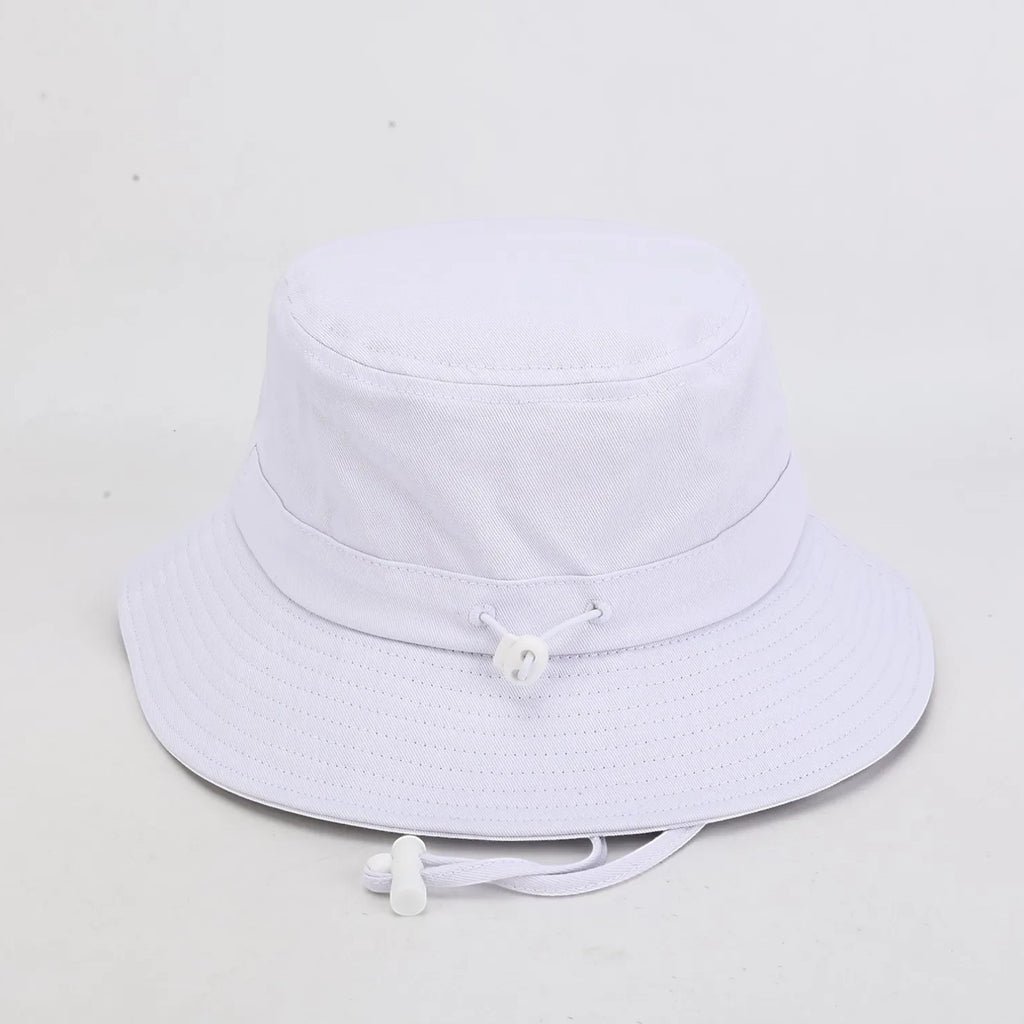 PBGC white bucket hat with an adjustable chin strap, perfect for sun protection on the golf course.
