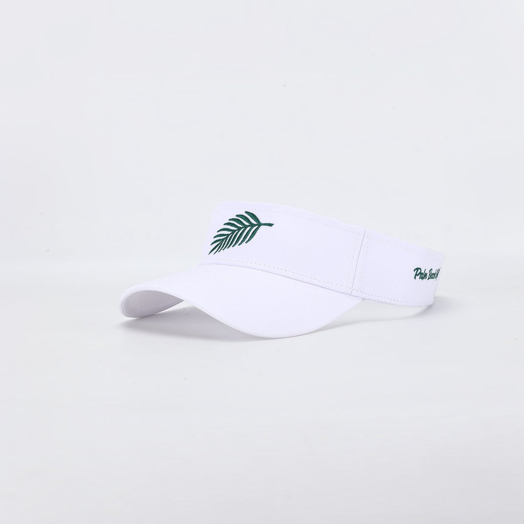 PBGC The Island Visor in white with a green palm leaf embroidery on the front and side logo detail.