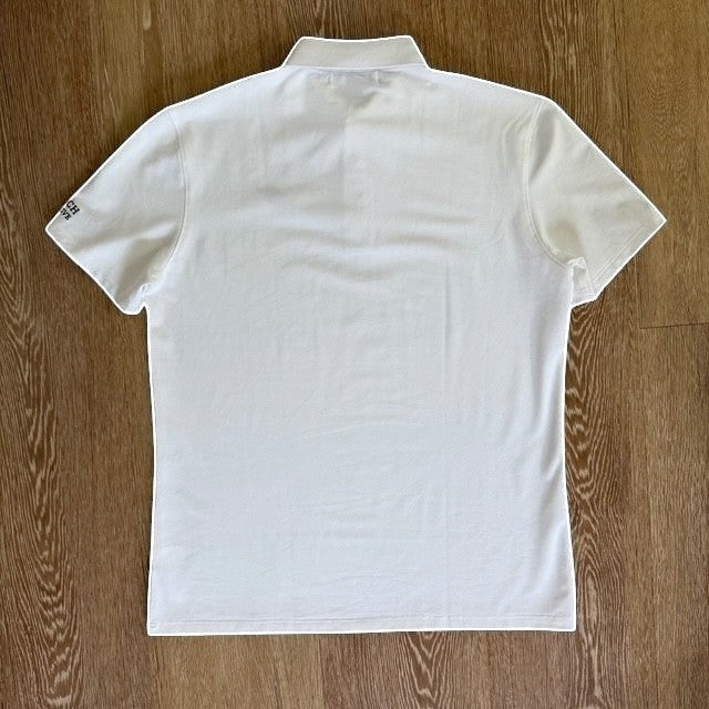 PBGC One Under Par white performance golf polo shirt, back view showing moisture-wicking fabric and short sleeves.