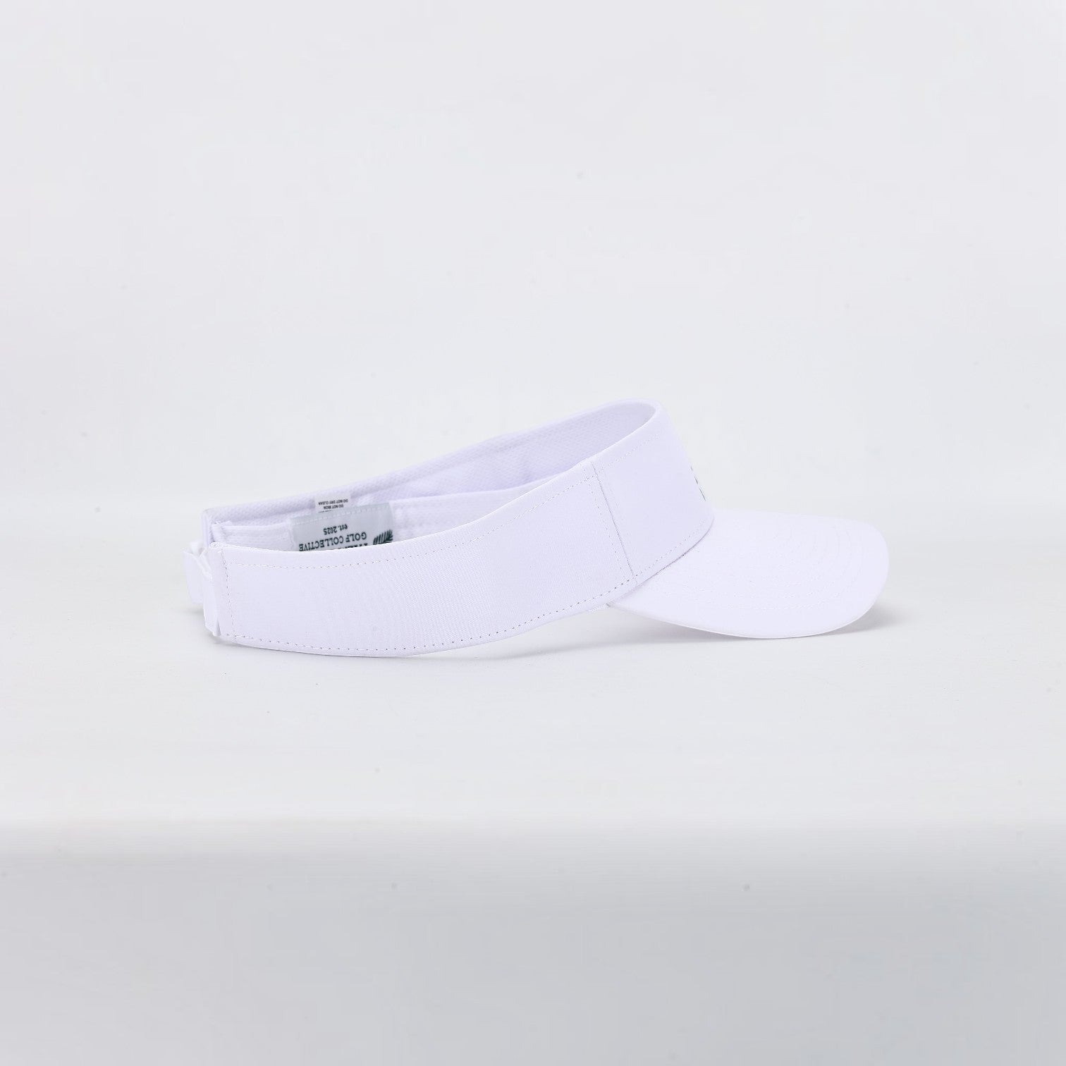 PBGC The Island Visor in crisp white, a lightweight and breathable performance golf visor with premium embroidery.