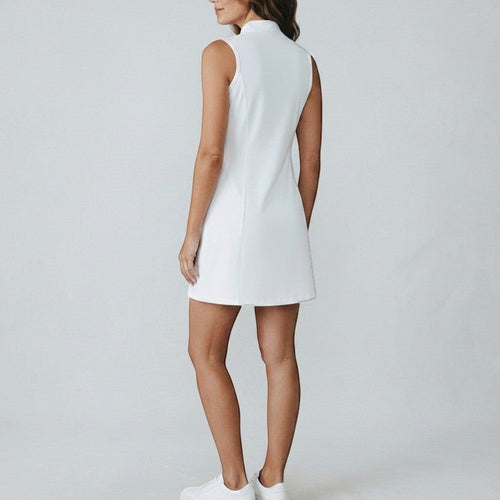 PBGC white sleeveless Caddie Dress with a flared skirt and mock neck, worn by a model from the back view.